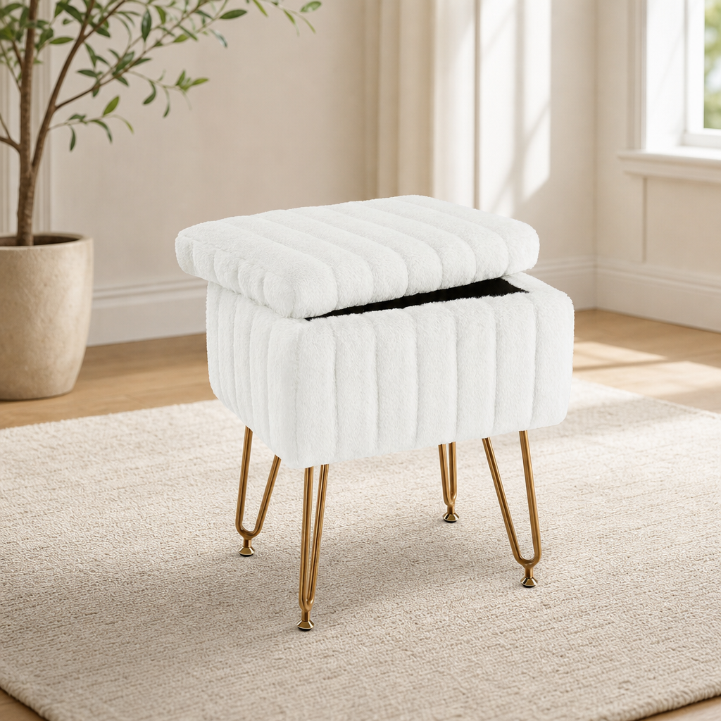 White faux-fur storage ottoman with removable top open and gold metal legs, angled front view in a bright room