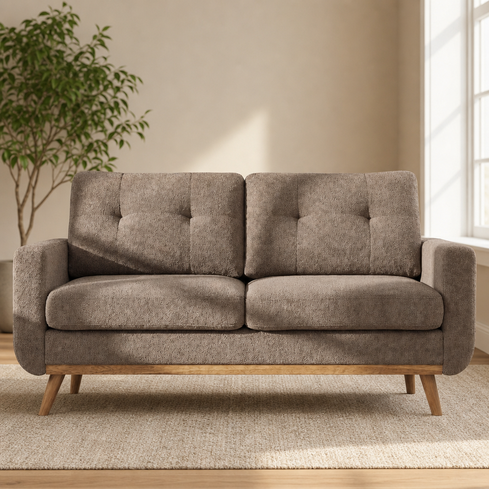 Camel tufted loveseat futon front view with solid wood legs in a bright living room