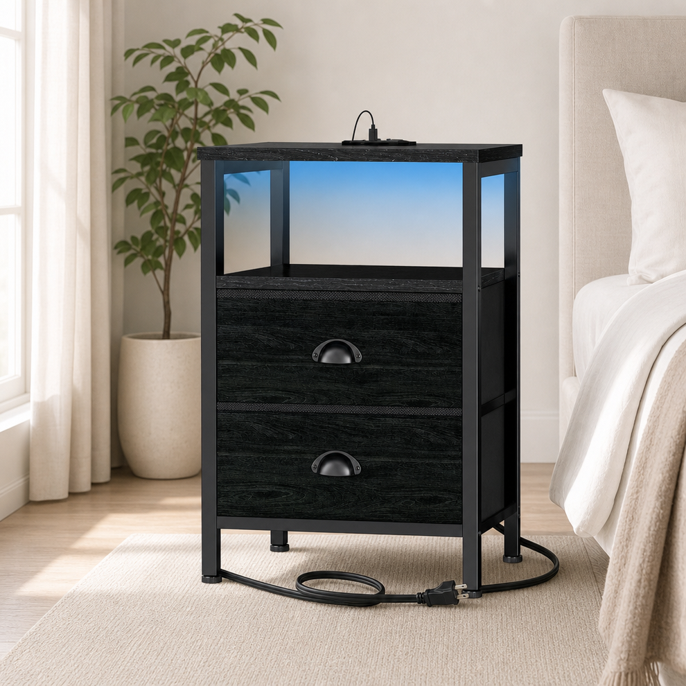 Black wood-finish nightstand with metal frame, front view showing two fabric drawers and coiled power cord at the base