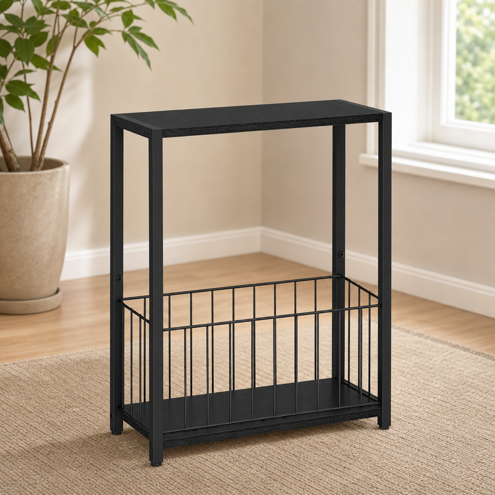 Black 2-tier narrow side table with lower wire basket angled front view in a living room setting