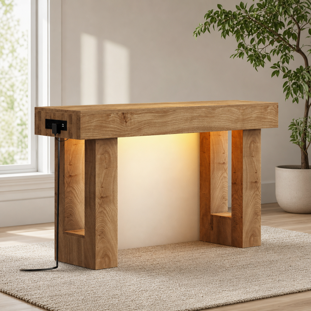 Natural oak console table angled front view showing built-in side charging port and warm underlighting