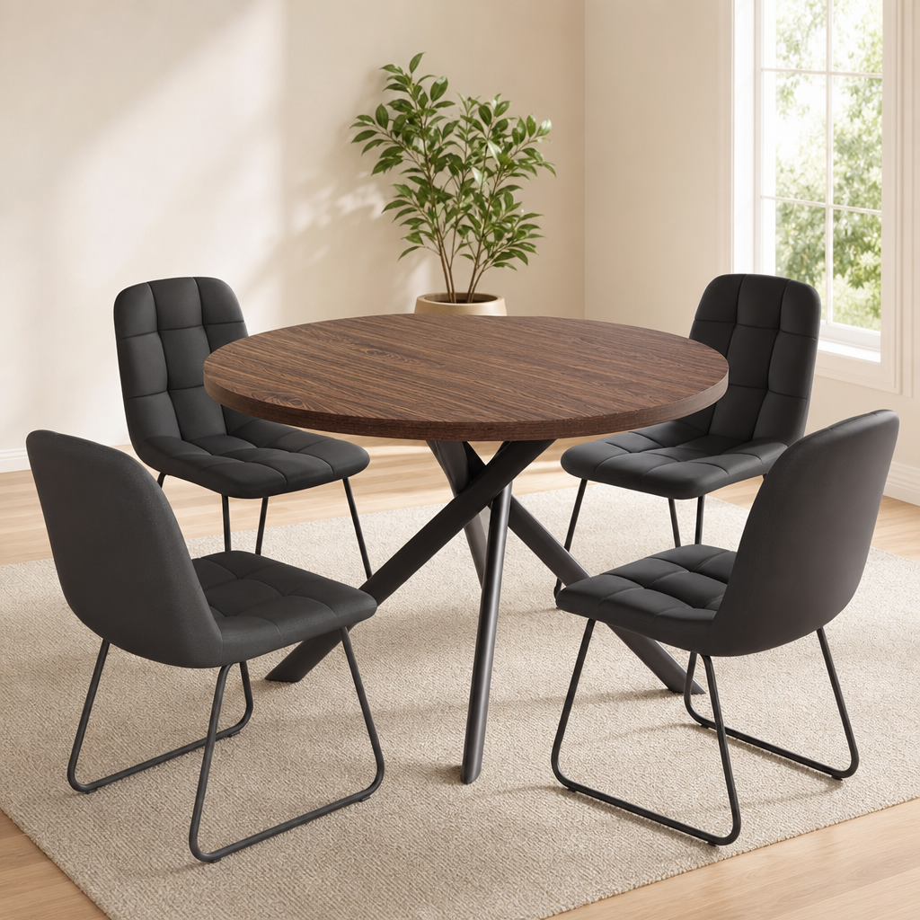 Walnut round 45.3-inch dining table with four black PU-upholstered chairs, angled front view in a bright room