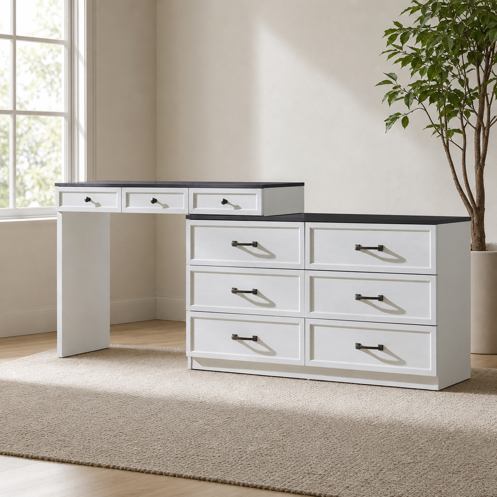 White farmhouse vanity desk with dark tempered glass tabletop, angled front view in a bright room