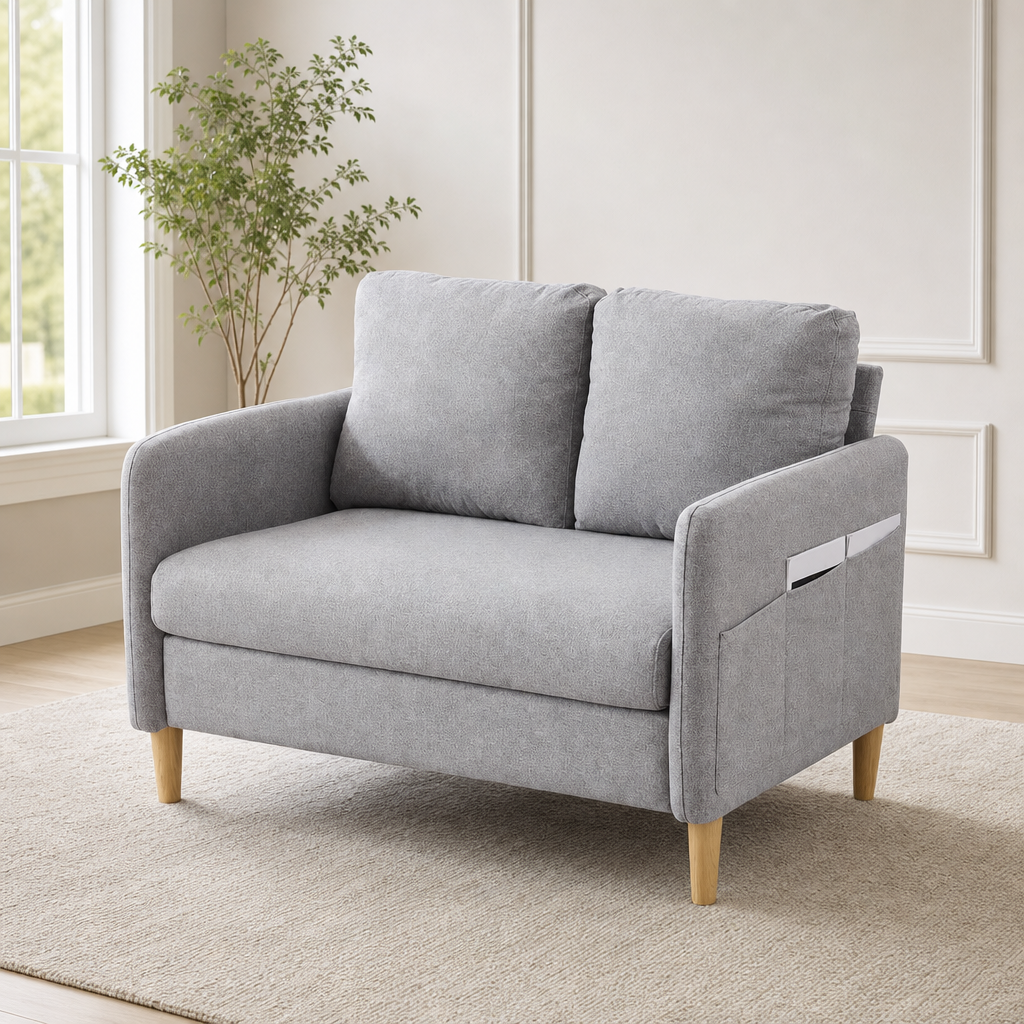 Light grey linen loveseat angled front view showing plush cushions and wooden legs in a bright room