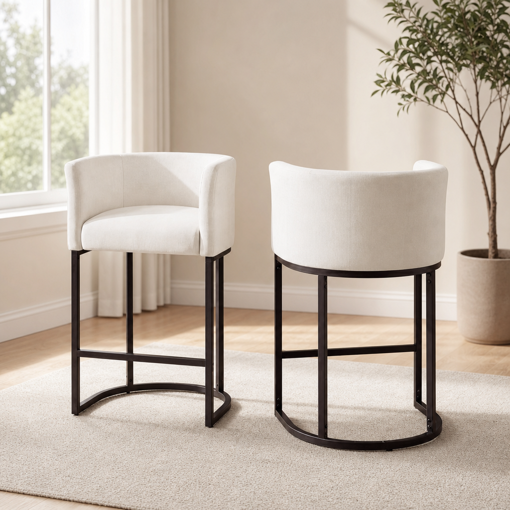 Off-white chenille counter stools shown as a pair with curved barrel backs and metal U-shaped bases in a bright room