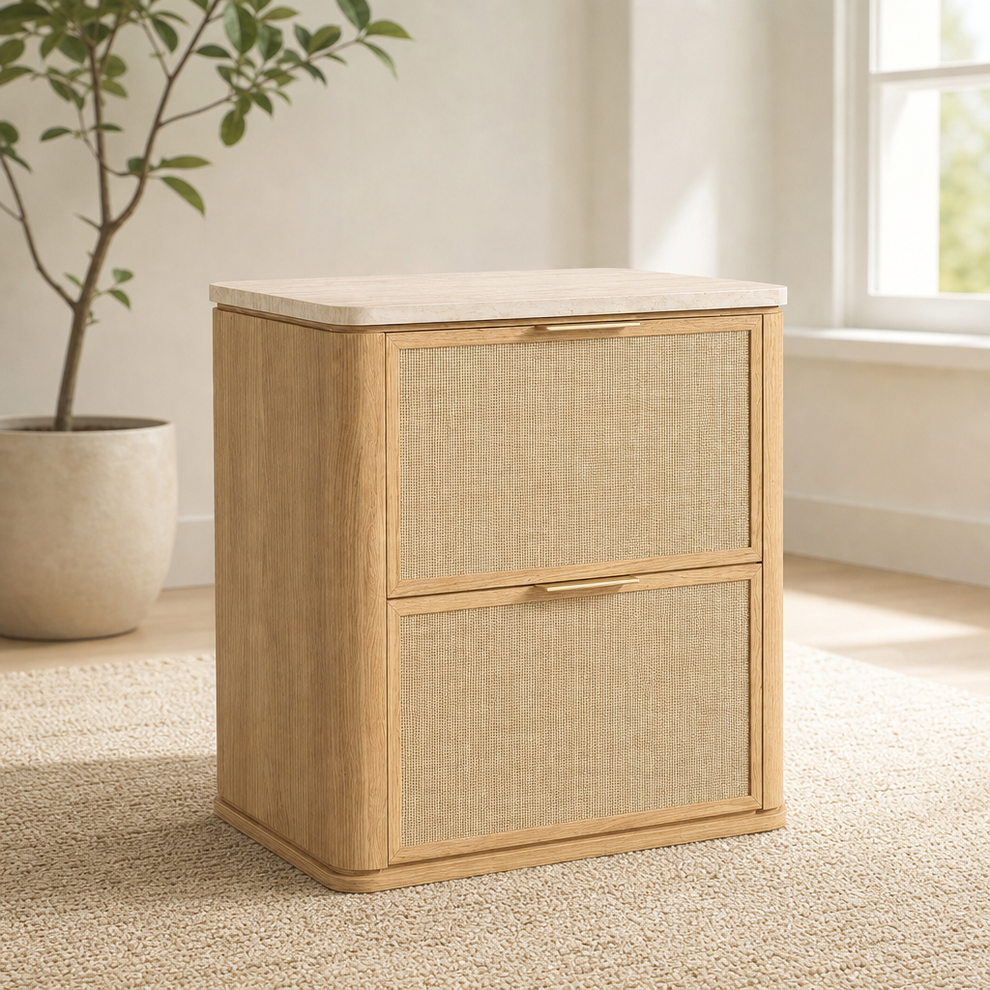 Rattan-Look Nightstand with Faux Travertine Top and Hand‑Woven Drawer Fronts centered in a warm neutral furnished room