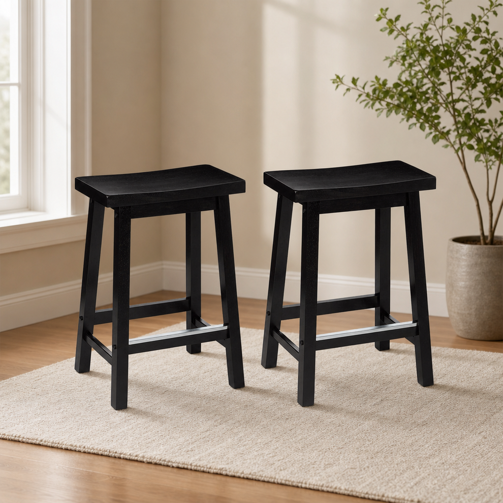 Solid Wood Counter-Height Saddle-Seat Stools, Set of 2 — 24-inch Seat centered in a warm neutral furnished room