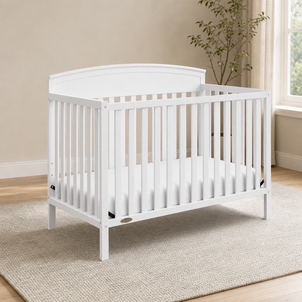 Graco Benton 5-in-1 Convertible Crib centered in a warm neutral furnished room