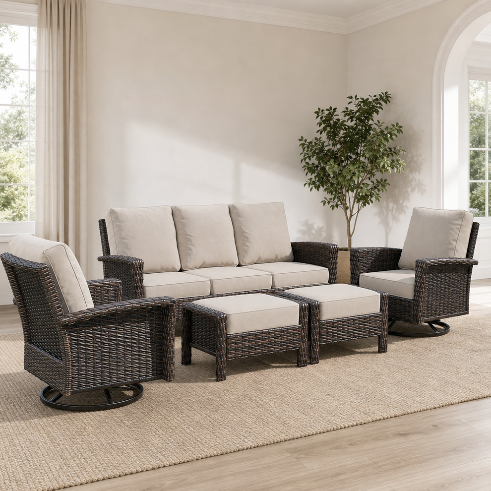 5‑Piece Outdoor Wicker Patio Conversation Set — 3‑Seat Sofa, 2 Swivel Chairs & 2 O centered in a warm neutral furnished room