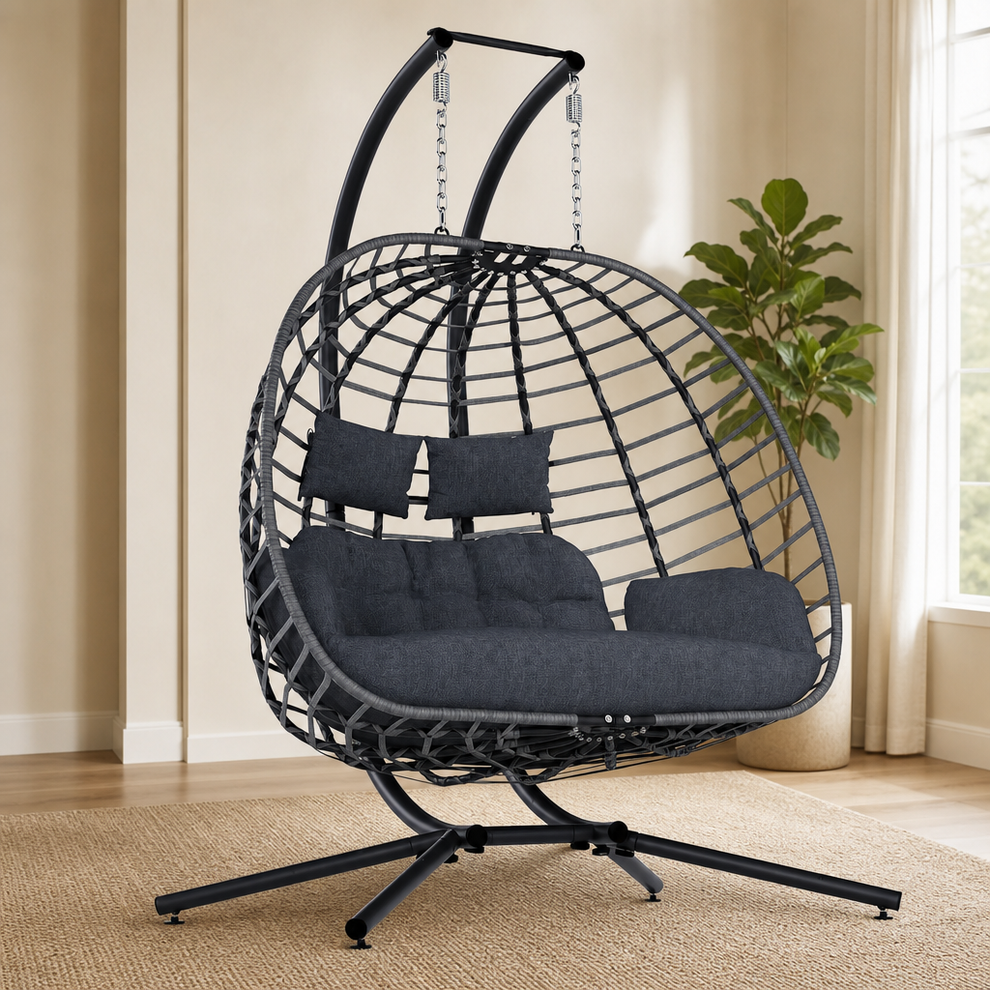 Double Egg Swing Chair with Stand — 2-Person Hanging Chair with 6-inch Cushion centered in a warm neutral furnished room