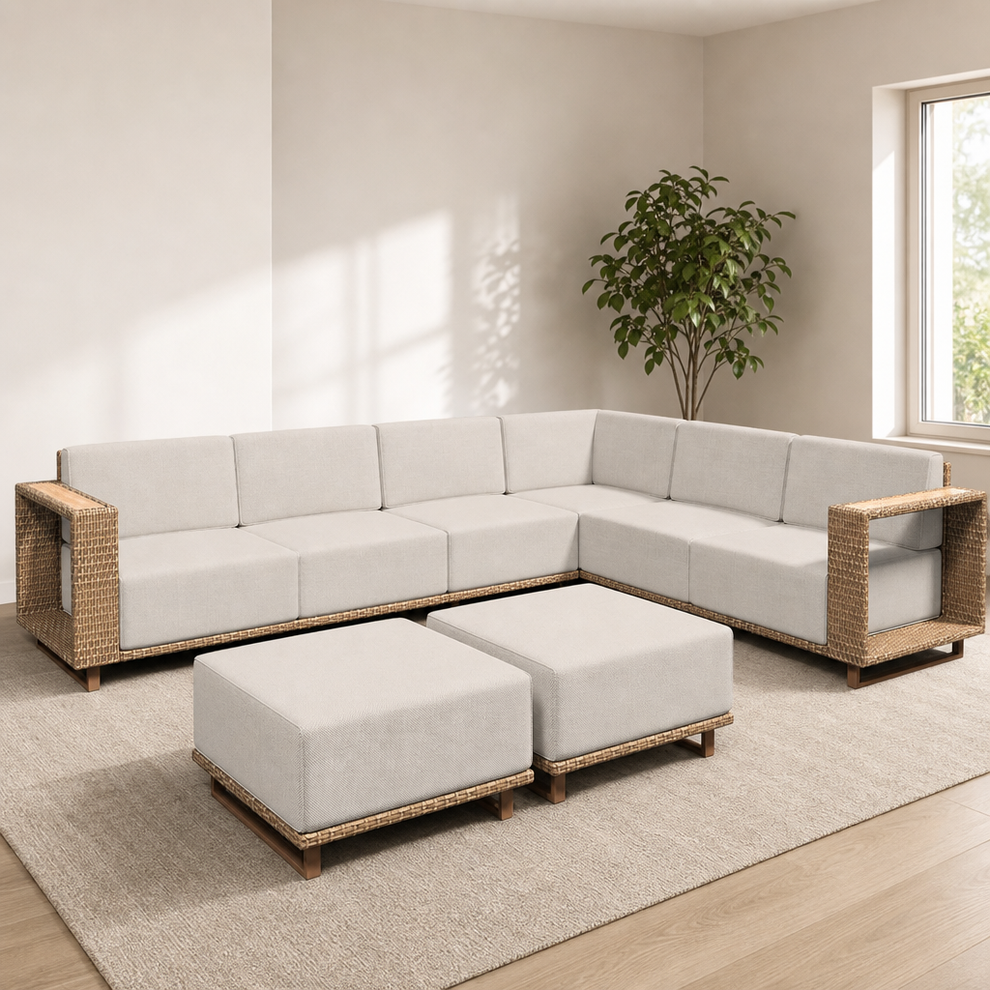 Modular Outdoor Sectional Sofa Set — Beige Rattan with 10" Cushions centered in a warm neutral furnished room