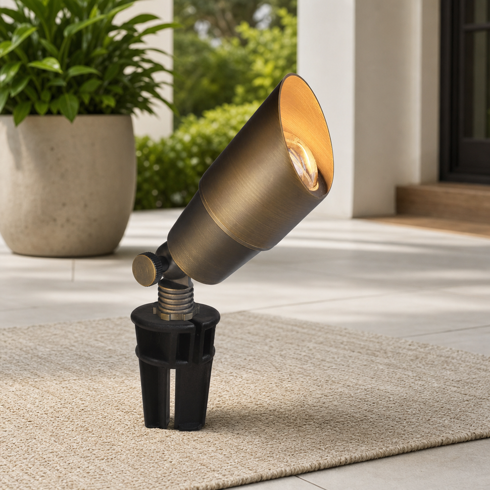 12V Brass Low-Voltage Landscape Spotlight — GU5.3 MR16 Socket, IP65 centered in a warm neutral furnished room