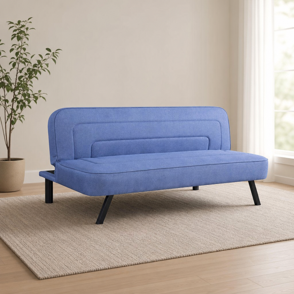 Serta Upholstered Convertible Futon Sofa — High-Density Foam, Metal Legs centered in a warm neutral furnished room