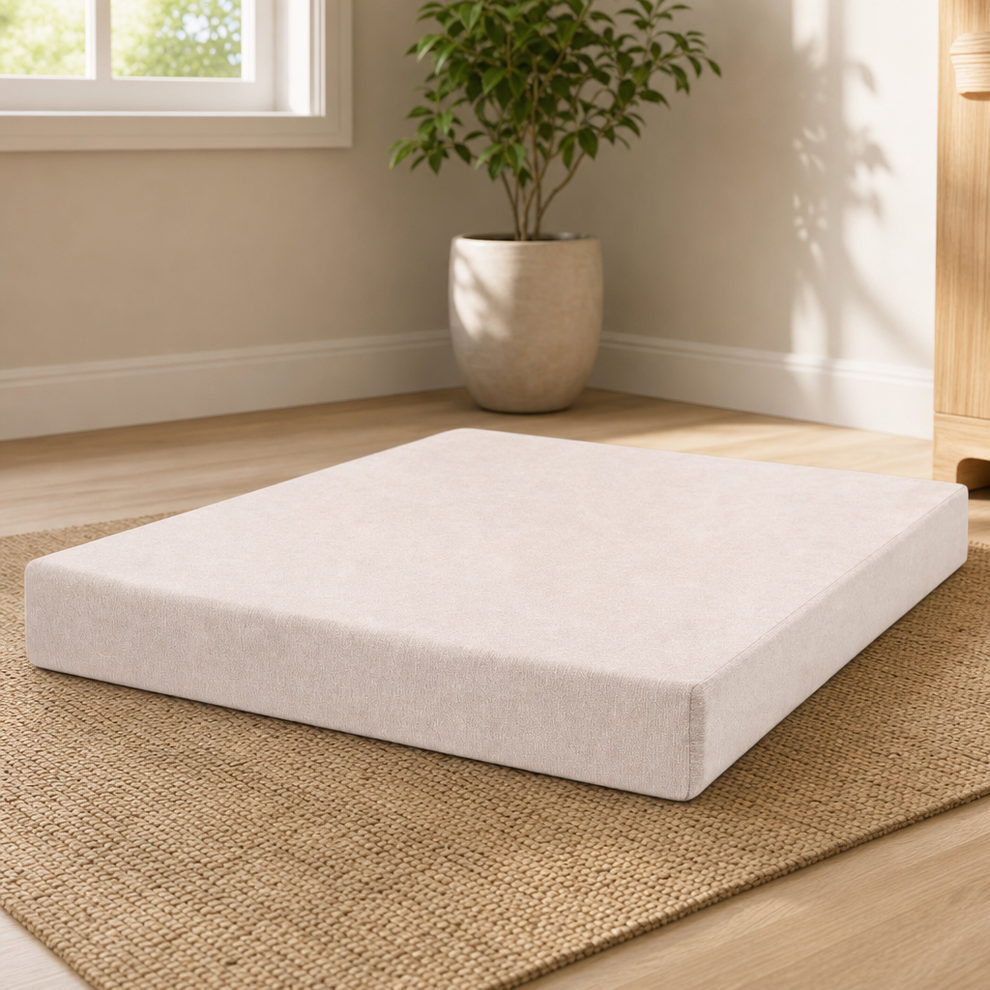 Giant Orthopedic Dog Bed, 7" Layered Foam — Removable Cover centered in a warm neutral furnished room