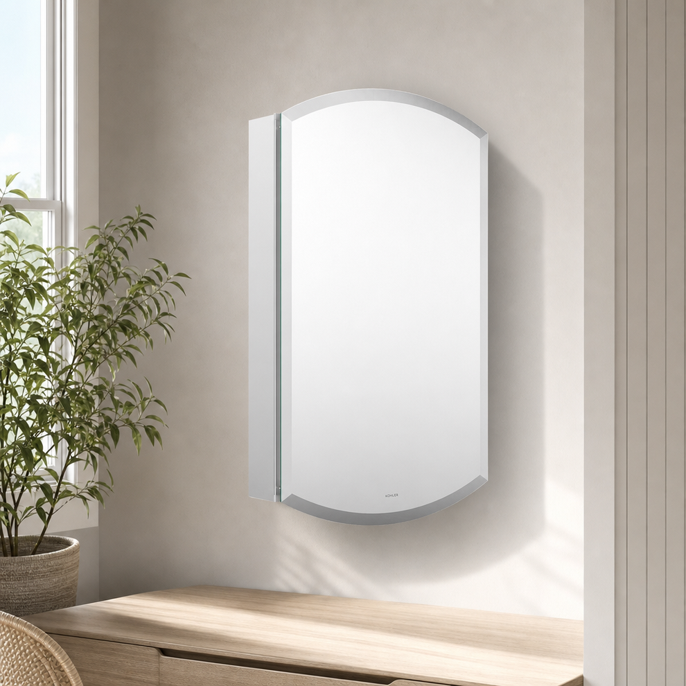 20" x 31" Anodized Aluminum Medicine Cabinet with Beveled Mirrors centered in a warm neutral furnished room