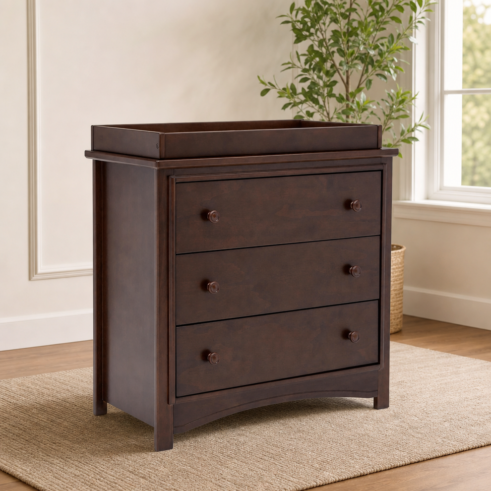 3-Drawer Dresser with Removable Changing Top centered in a warm neutral furnished room