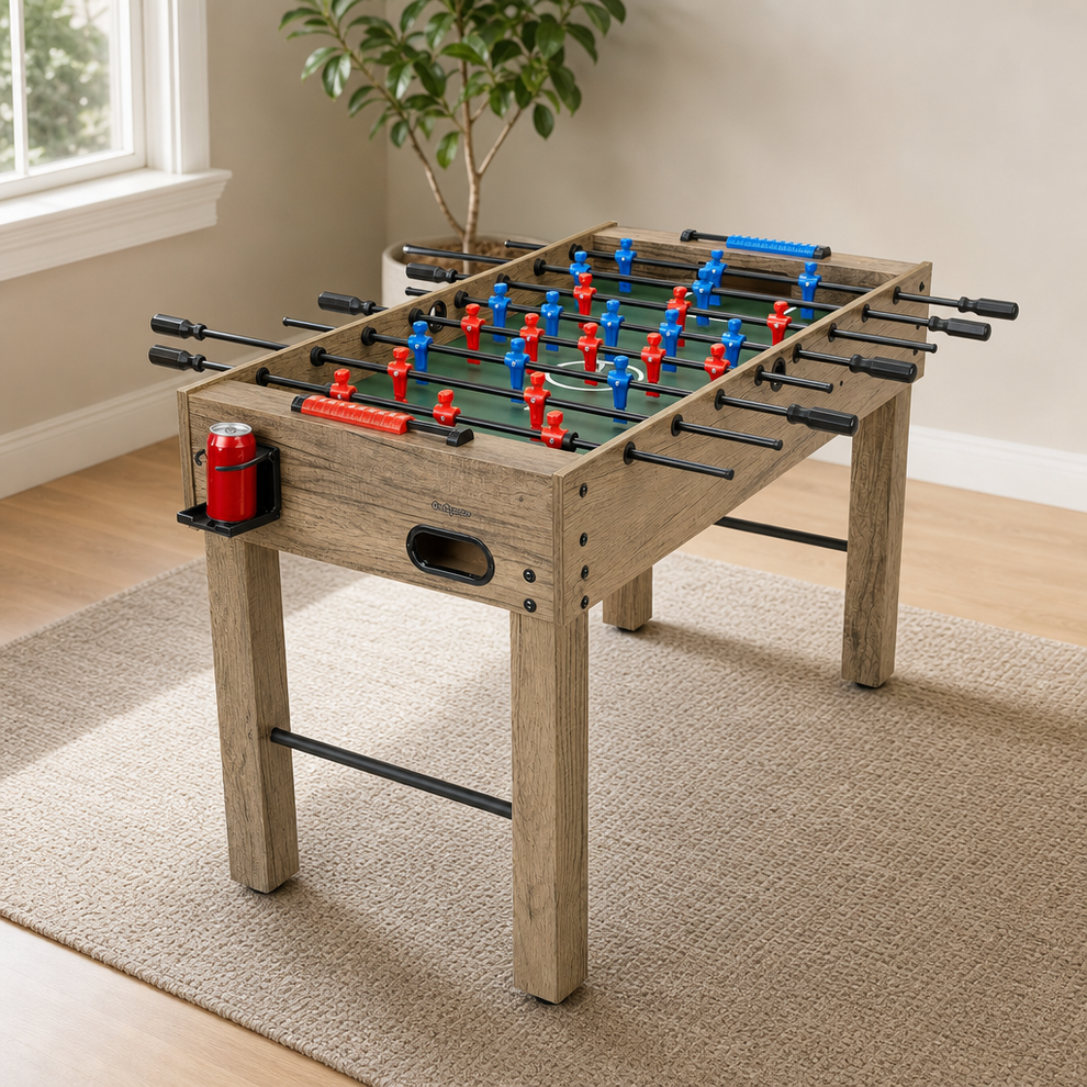 Foosball Table 48-Inch Composite Wood — Oak, Black or White centered in a warm neutral furnished room