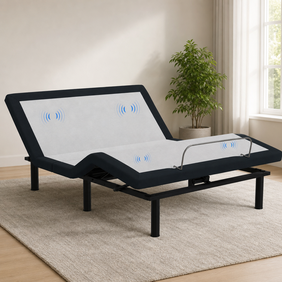 E4 Adjustable Bed Base with Massage, LED Under-Bed Light & USB Charging centered in a warm neutral furnished room