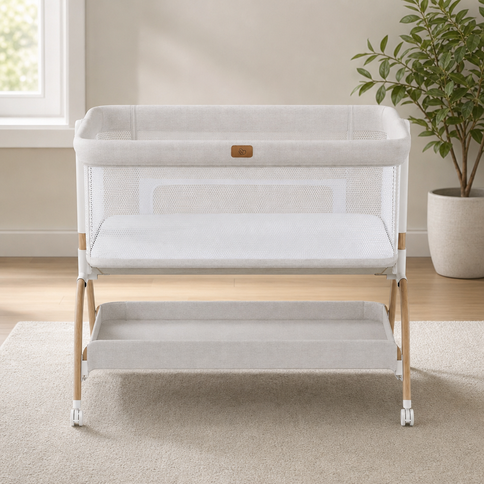 3‑in‑1 Baby Bassinet & Bedside Sleeper with Mattress and Pre‑Installed Sheet centered in a warm neutral furnished room