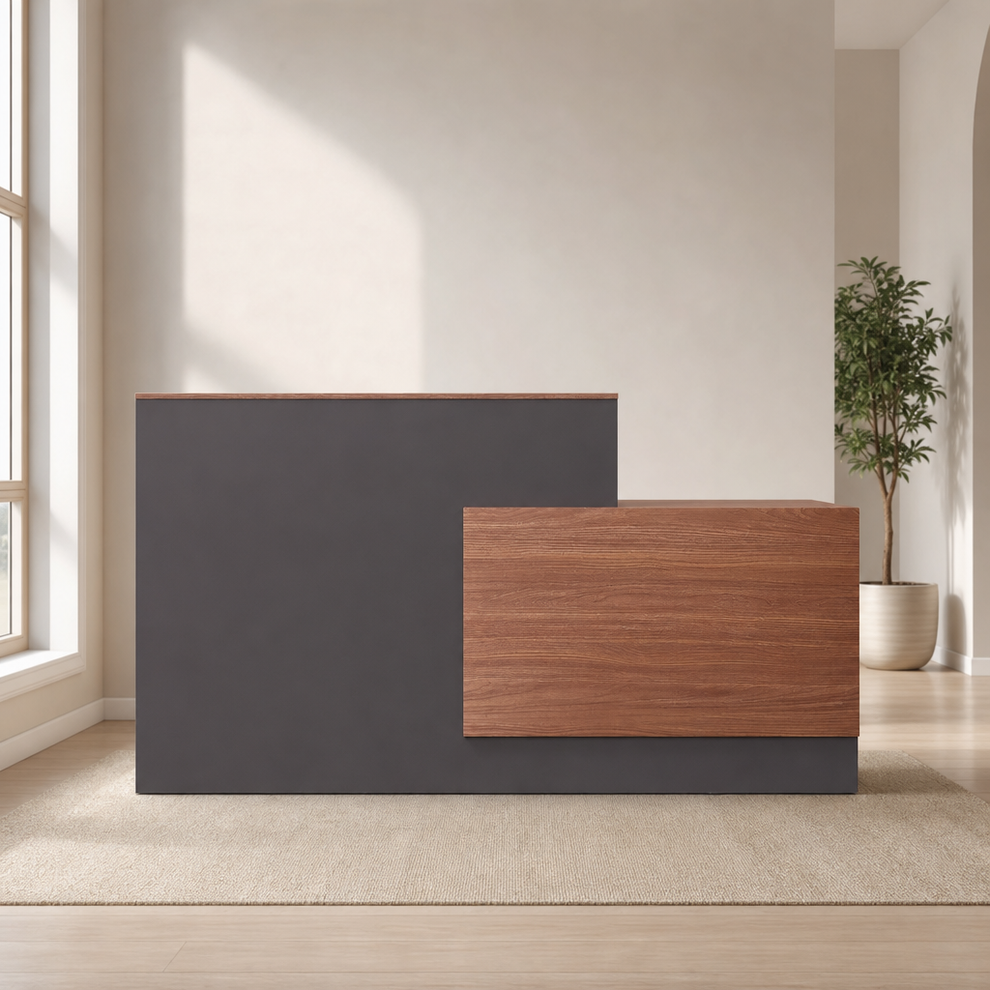 L-Shaped Reception Desk with Locking Drawers & Keyboard Tray, Multiple Sizes centered in a warm neutral furnished room