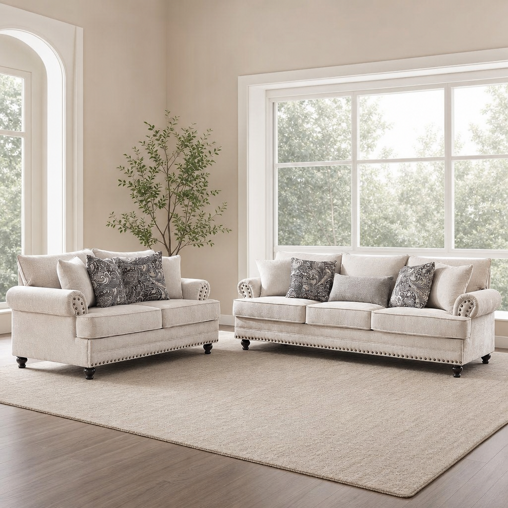 Paisley Chenille Sofa and Loveseat with Nailhead Trim centered in a warm neutral furnished room