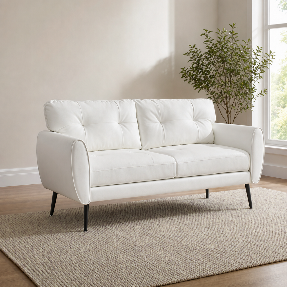 Mid-Century Tufted Faux Leather Loveseat, Tufted Back, Solid Wood Frame centered in a warm neutral furnished room