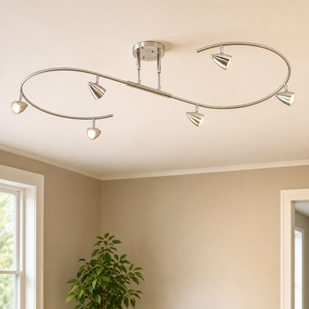 54" S-Wave 6-Light LED Ceiling Track Light, Brushed Nickel centered in a warm neutral furnished room