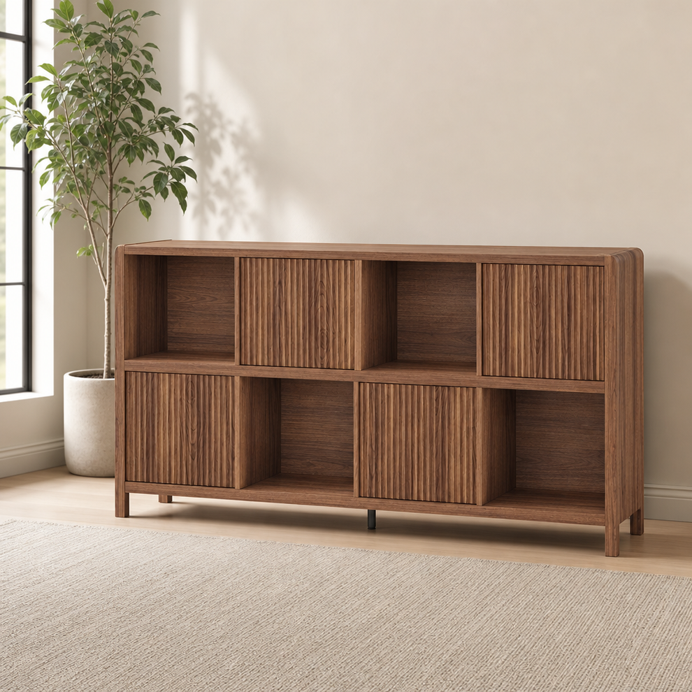 8-Cube Bookcase with 4 Waveform-Fluted Doors, 57.17" W x 11.85" D x 30.12" H centered in a warm neutral furnished room