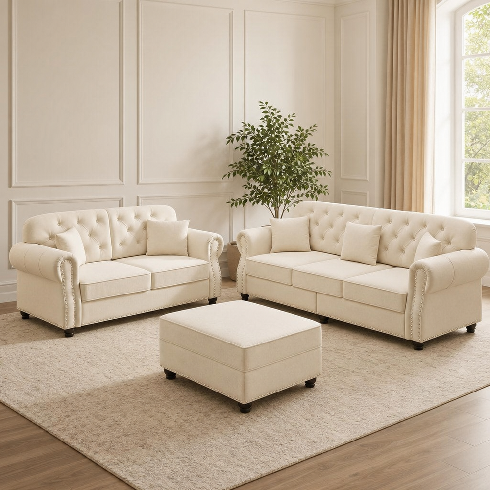 Velvet Chesterfield Sofa, Loveseat & Ottoman Set — Button Tufted centered in a warm neutral furnished room
