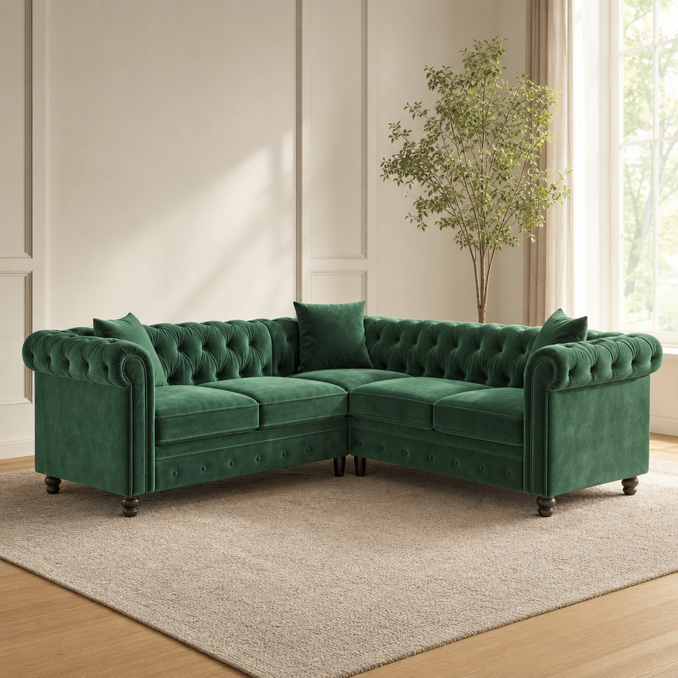 Velvet Chesterfield L-Shaped Sectional Sofa, Tufted Back, Green centered in a warm neutral furnished room