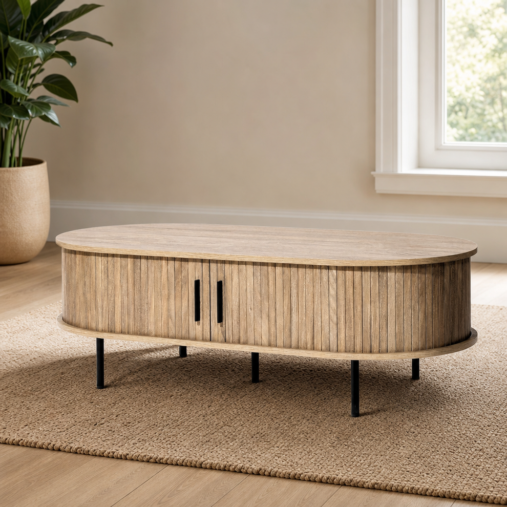 Oval Coffee Table with Sliding Tambour Doors, Oak-Grain Finish centered in a warm neutral furnished room