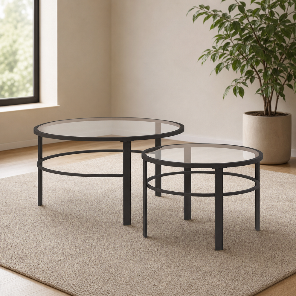 36" Round Tempered Glass Nesting Coffee Tables, Metal Frame, Blackened Bronze centered in a warm neutral furnished room