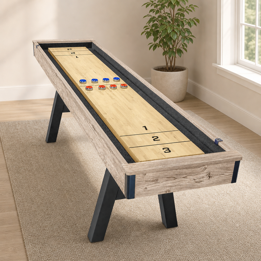 Shuffleboard Table — 9 ft Rustic Oak Frame with Composite Butcher Block Surface centered in a warm neutral furnished room