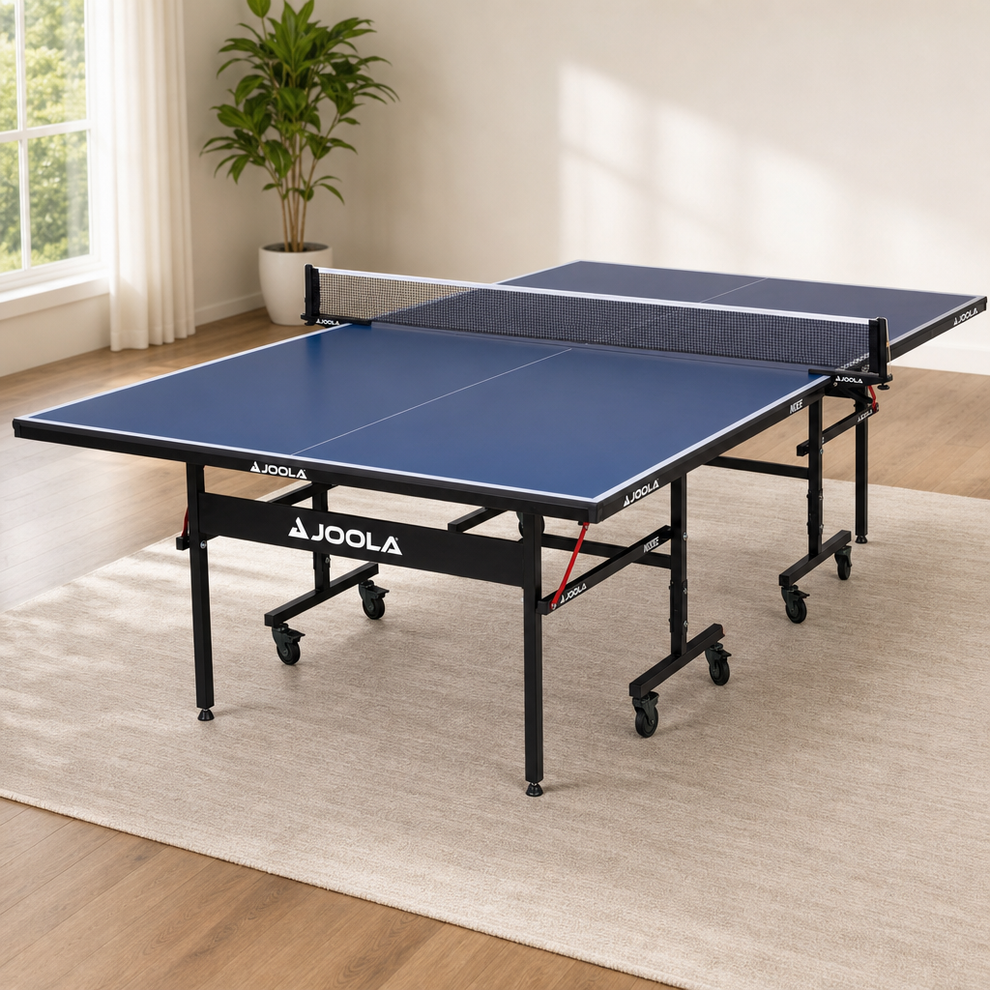 Table Tennis Table — Regulation Indoor Foldable MDF Surface with Playback Mode & L centered in a warm neutral furnished room
