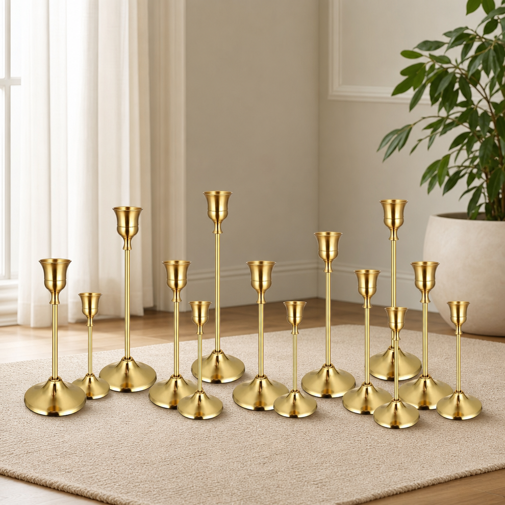 Vintage Metal Taper Candle Holder Set, Gold or Black centered in a warm neutral furnished room