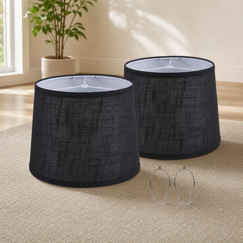 Lamp Shades 2-Pack — Medium Linen Spider Fitter with Harps & Finials centered in a warm neutral furnished room