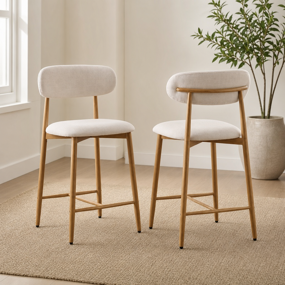 MOLENE Upholstered Counter Height Bar Stool with Back and Metal Frame centered in a warm neutral furnished room