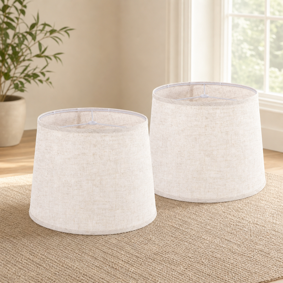 Drum Lampshade, Beige Oatmeal Linen, Spider Fitter, Multiple Sizes centered in a warm neutral furnished room