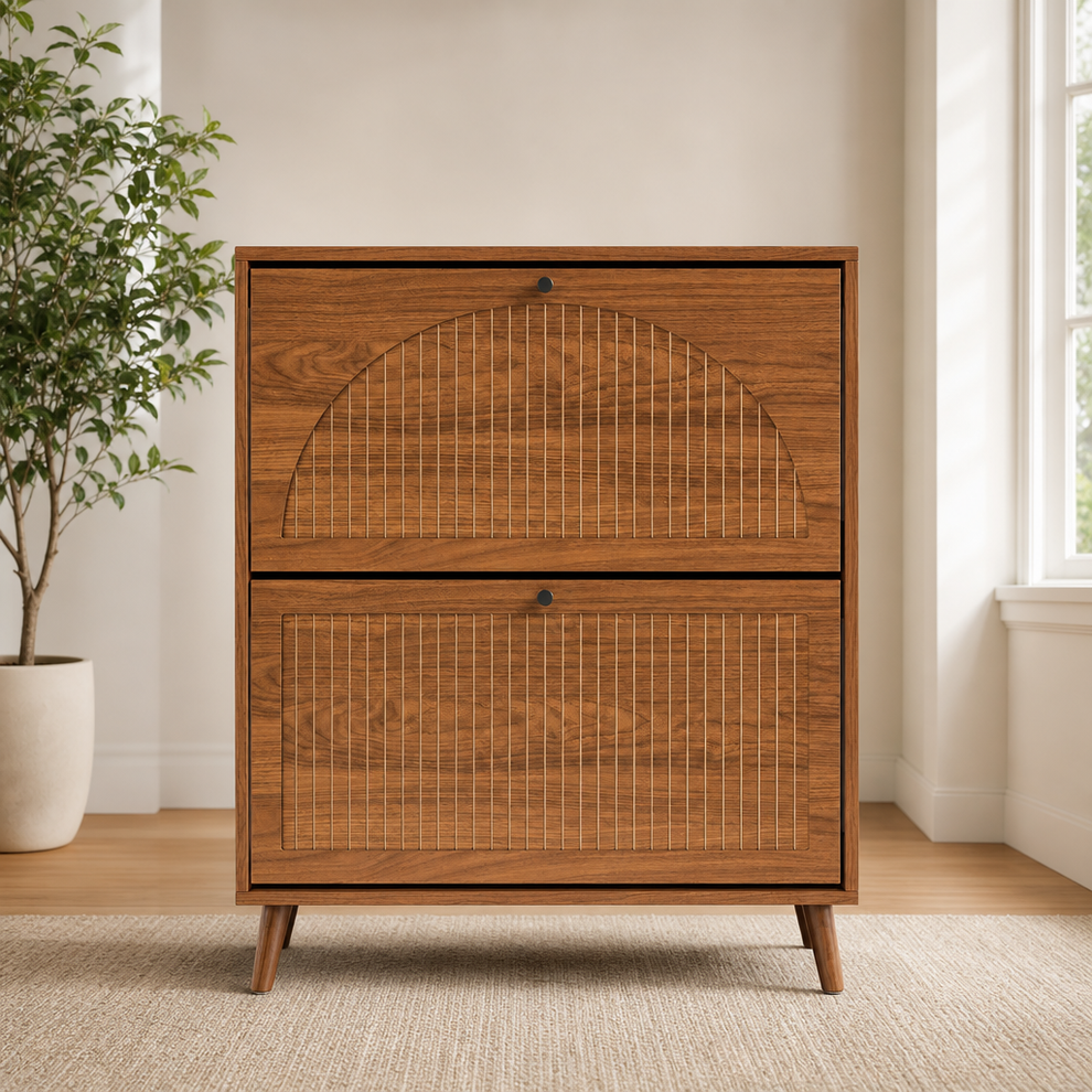Walnut-finish slim shoe cabinet front view with fluted drawer panels, black knob handles and tapered wooden legs