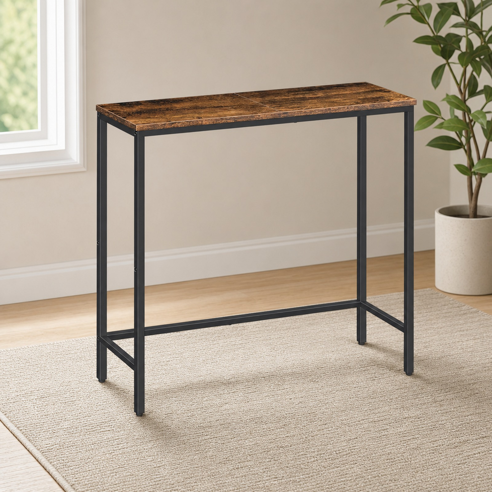 Rustic brown and black console table shown in a bright room