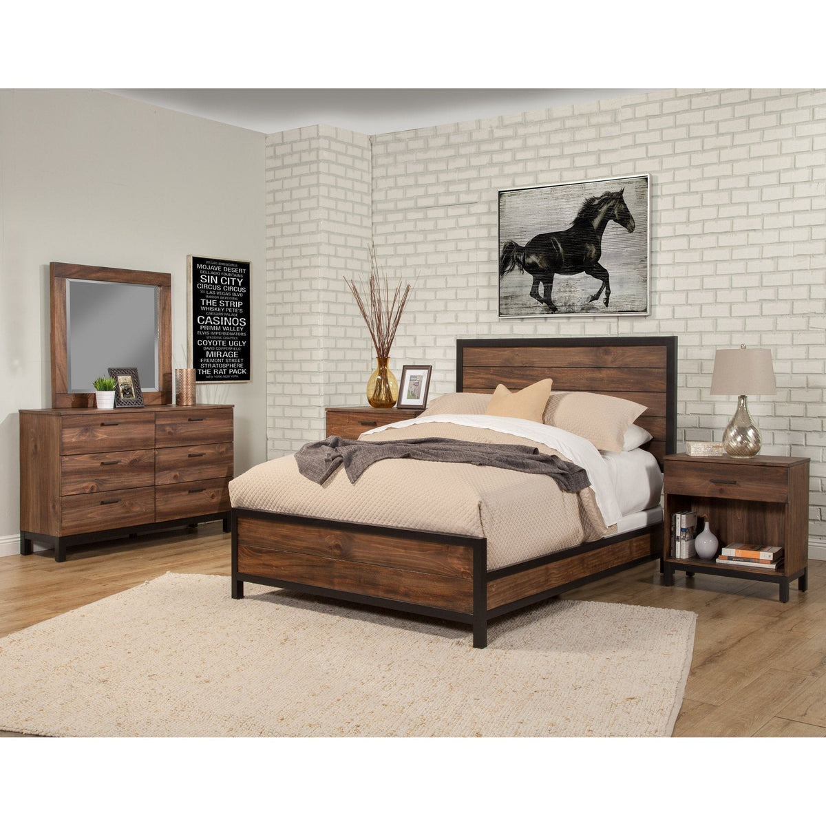 Dark wood bed with black frame styled in a bedroom with matching furniture